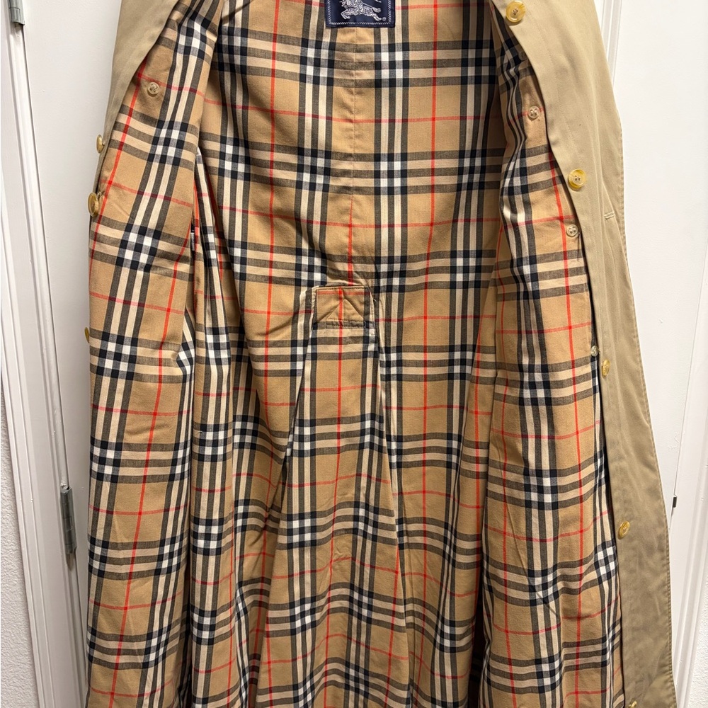 Beige Double-Breasted Trench Coat. Not an original Burberry, has LIKE pattern.